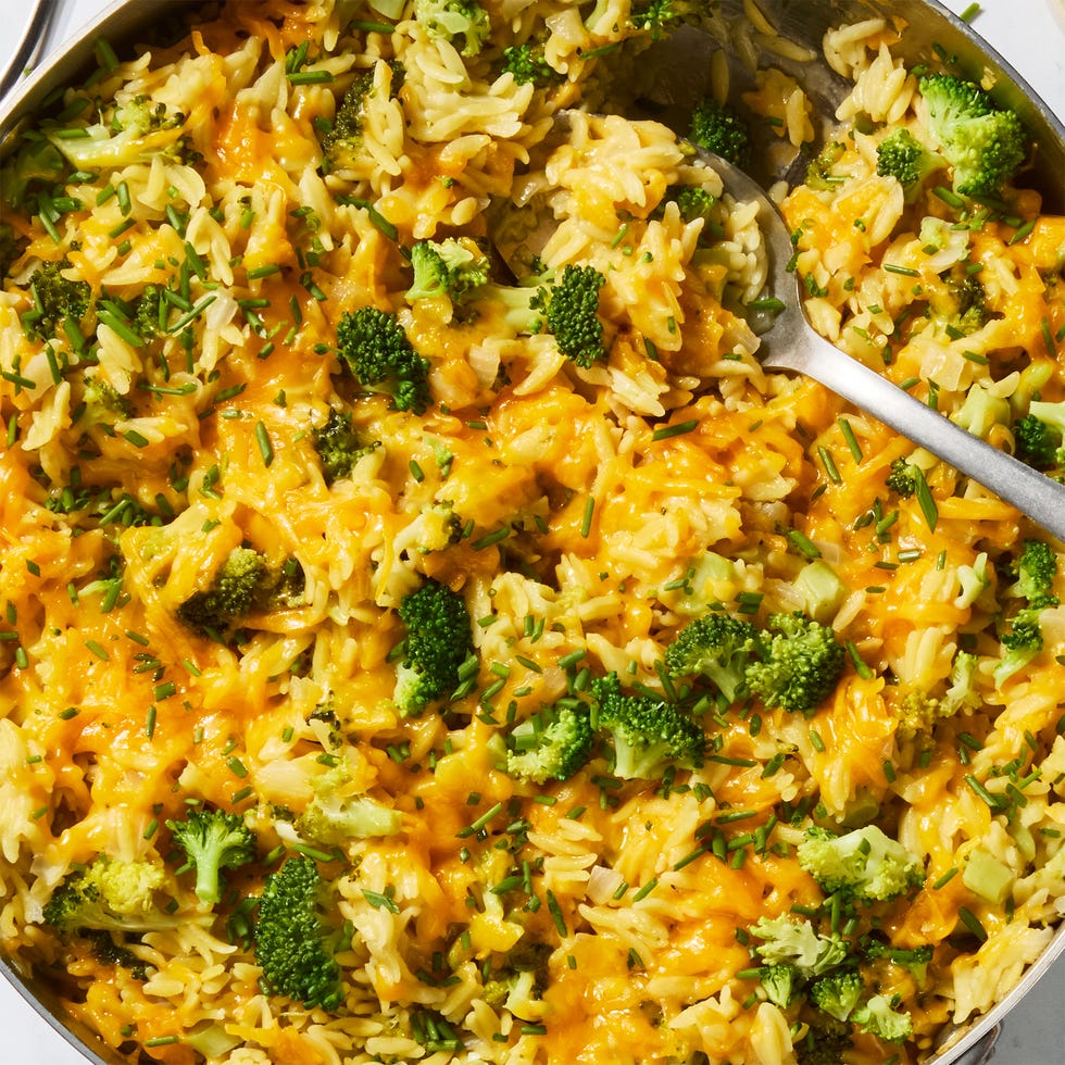 cheesy broccoli cheddar orzo in a pan