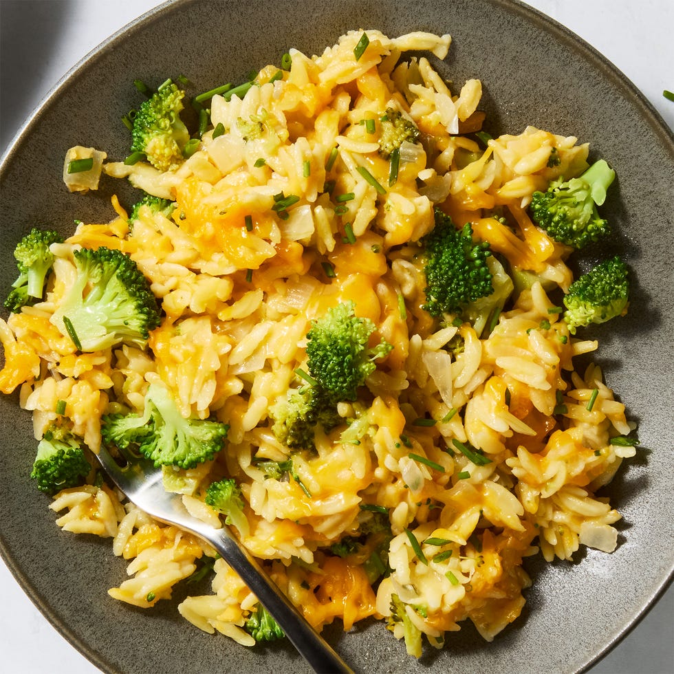 cheesy broccoli cheddar orzo in a pan