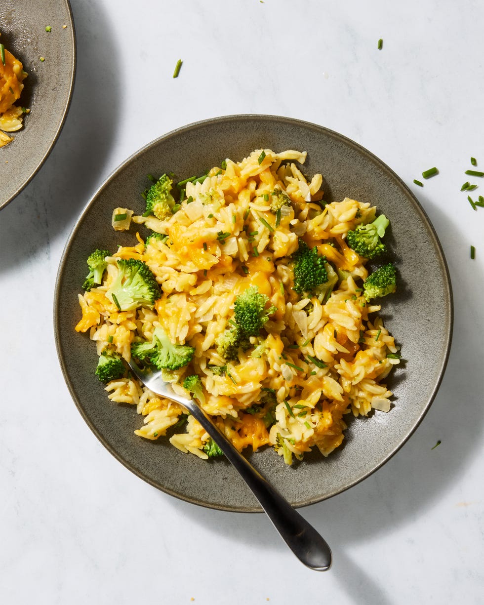 cheesy broccoli cheddar orzo in a pan