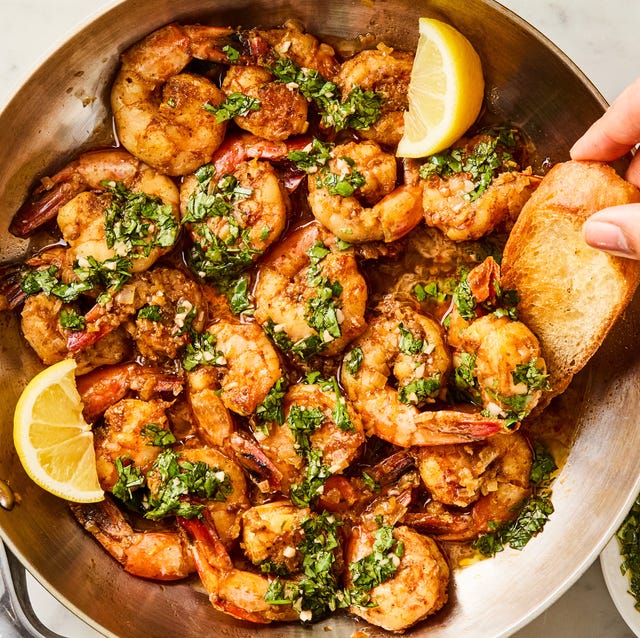 One-Pan Chimichurri Shrimp for this under 30 minute one pan dinner, cumin and coriander marinated shrimp are cooked with shallots, topped with a parsley, cilantro, and oregano based chimichurri sauce, and served with crusty bread