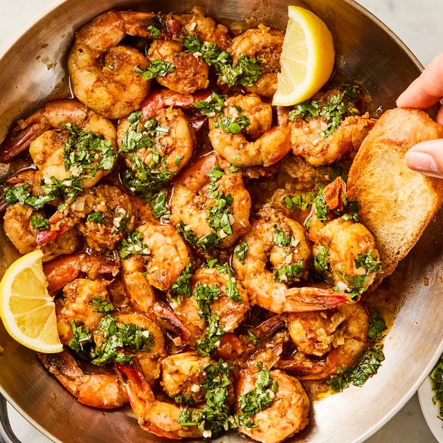 One-Pan Chimichurri Shrimp for this under 30 minute one pan dinner, cumin and coriander marinated shrimp are cooked with shallots, topped with a parsley, cilantro, and oregano based chimichurri sauce, and served with crusty bread