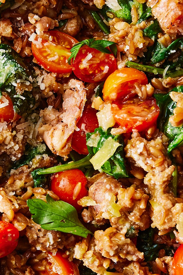 One-Pot Farro With Chicken Sausage & Tomatoes one pot farro with chicken sausage and tomatoes topped with fresh herbs