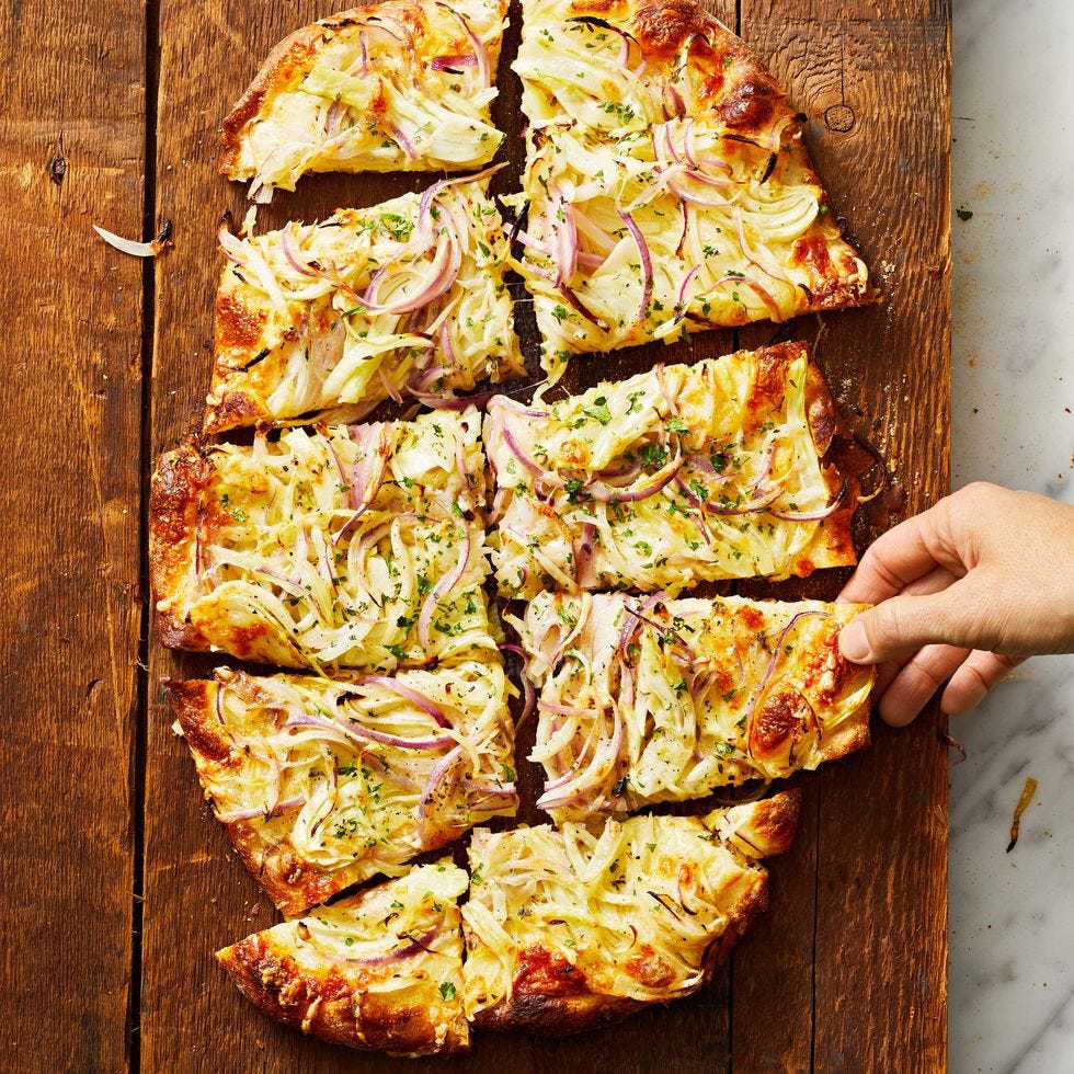 onion flatbread on a wooden table
