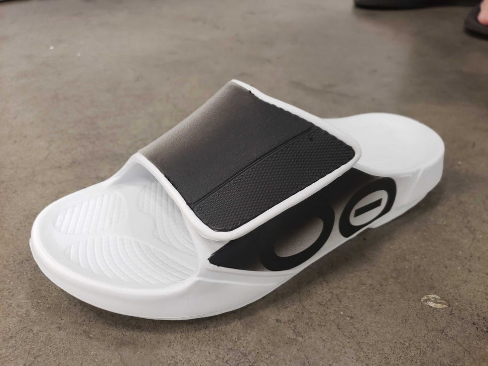 White, Footwear, Shoe, Slipper, Font, Automotive exterior, Plimsoll shoe, 