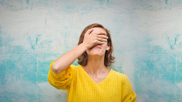 young woman regretting a choice she has made