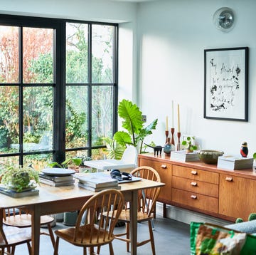 modern lounge with dining table with garden view