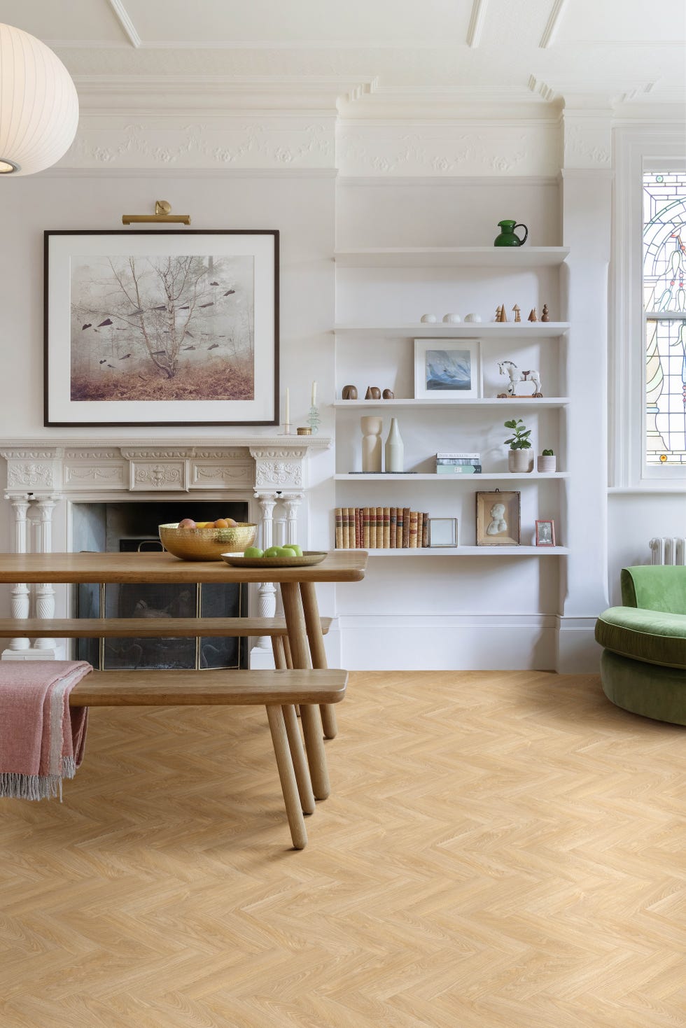 openplan living and dining room with wooden herringbone flooring