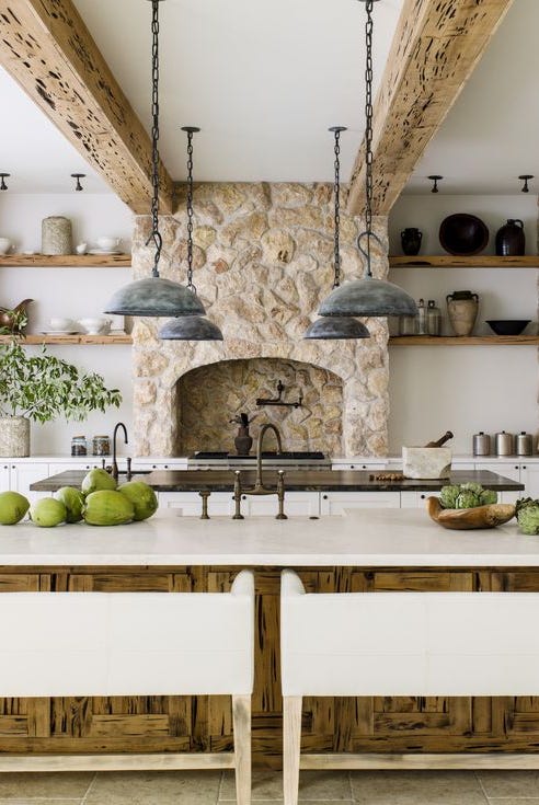 wood open shelves near stone range hood