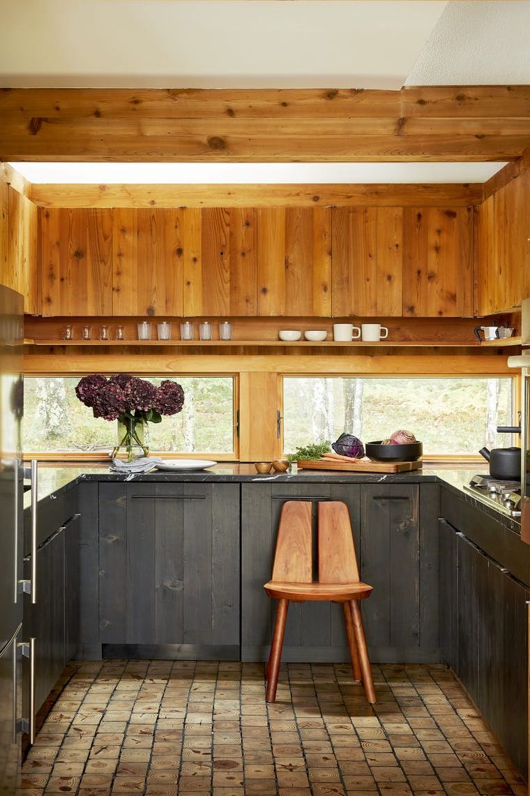 open and closed cabinetry in warm wood