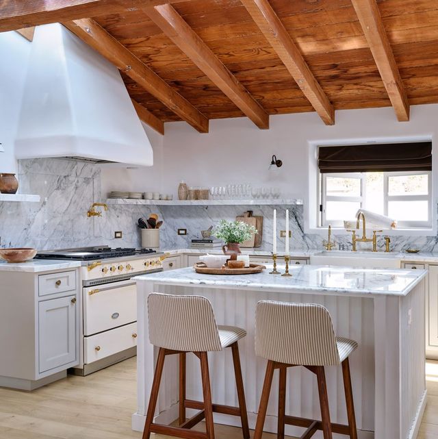 marble white kitchen with same color open shelves