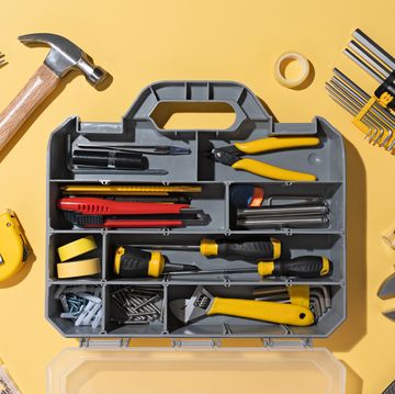 opened diy toolbox with a collection of tools
