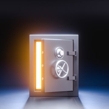 opened safe deposit with glowing insides