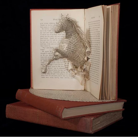 Artist Creates Sculpture from Pages of Books