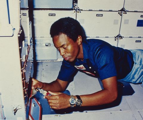 1983  dr guion s bluford jnr, a mission specialist on sts 8, the third flight of the orbiter challenger checks out the sample pump on the continuous flow electrophoresis system cfes on the mid deck cfes is an experiment designed to separate biological materials according to their surface electrical charge as they pass through an electric field  photo by mpigetty images