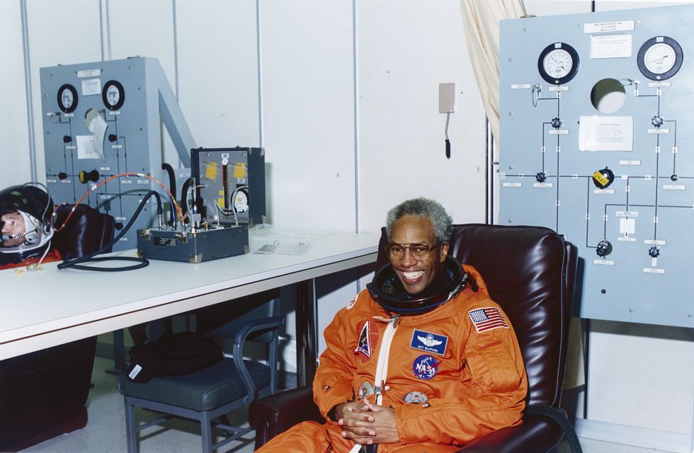 a relaxed and smiling sts 39 mission specialist guion s bluford jr dons his partial pressure suit in the operations and checkout building, kennedy space center, florida, april 28, 1991 bluford, the first african american in space, first went to space in 1983 photo by nasainterim archivesgetty images