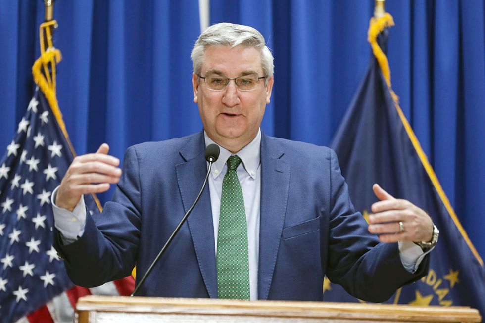 indiana gov eric holcomb answers about his statewide stay at home order during a briefing at the statehouse in indianapolis, tuesday, march 24, 2020 holcomb ordered state residents to remain in their homes except when they are at work or for permitted activities, such as taking care of others, obtaining necessary supplies, and for health and safety the order is in effect from march 25 to april 7 ap photomichael conroy