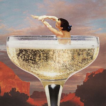 woman in champagne glass indulges in sober curiosity