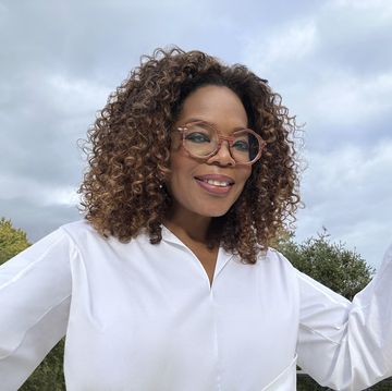 oprah winfrey in a white shirt outside