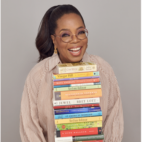 a woman holding a book