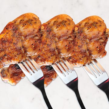 Chicken Dinner a piece of pizza with a fork