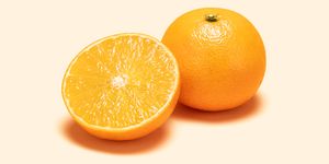 orange and cross section on colored background
