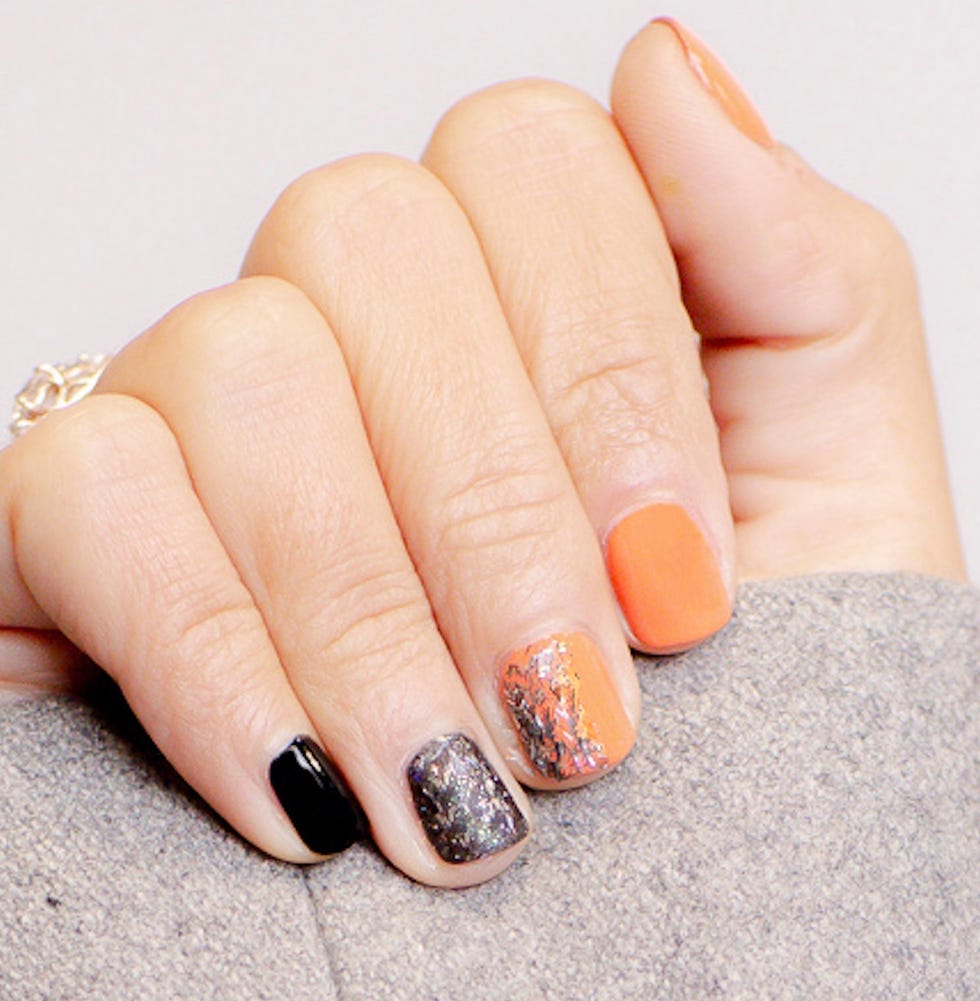 bellacures orange and black nails