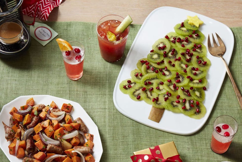 orange cranberry mimosas on a green cloth