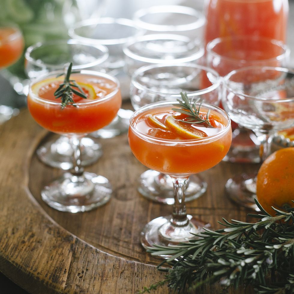 orange gin and tonic cocktails with rosemary