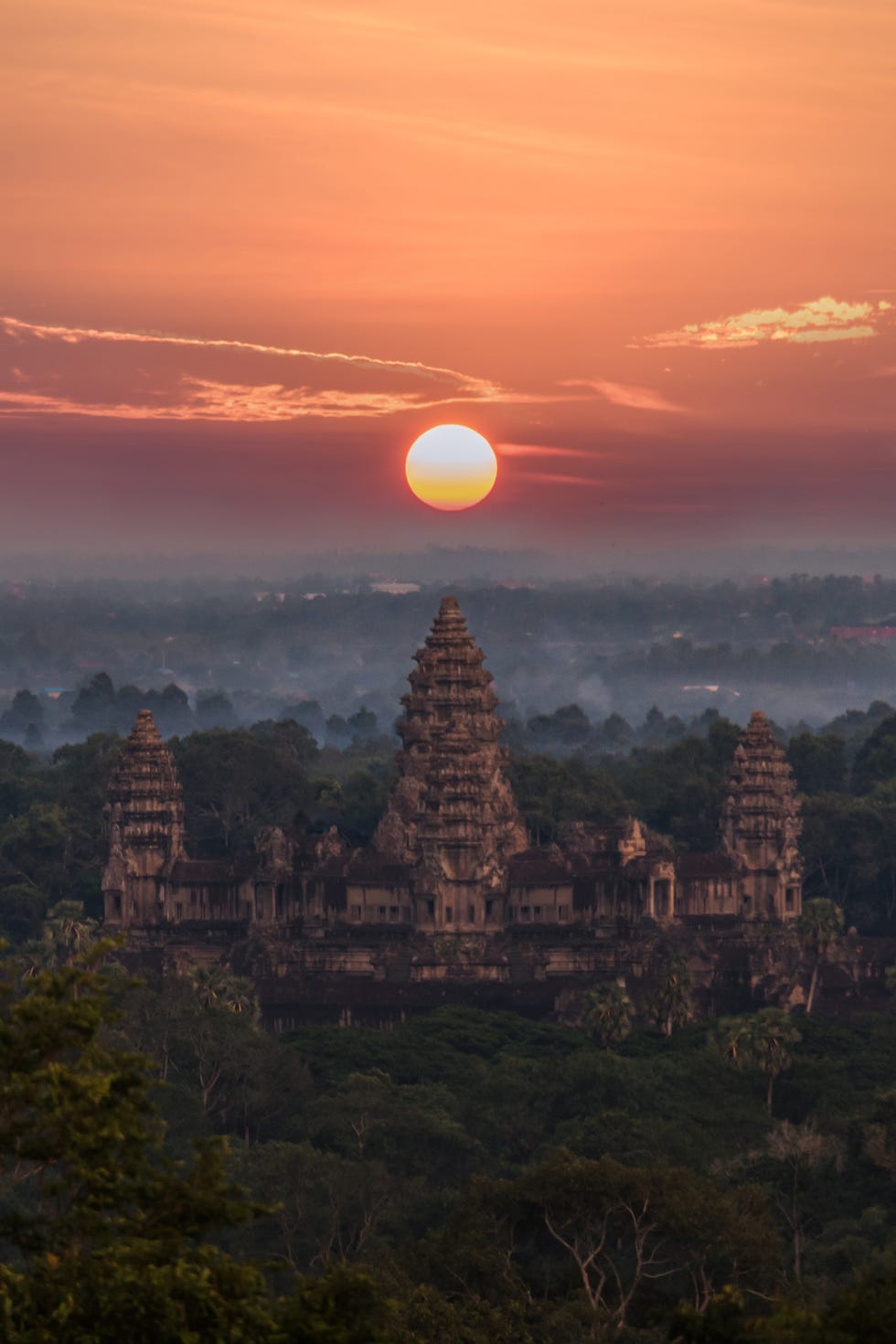 orange sunrise at angkor wat , siem reap , cambodia