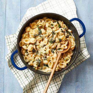 orecchiette with white beans and spinach in a dutch oven pot