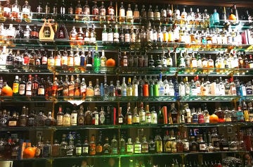alcohol, bar, distilled beverage, liquor store, drink, alcoholic beverage, liqueur, bottle, glass bottle, building,