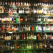 alcohol, bar, distilled beverage, liquor store, drink, alcoholic beverage, liqueur, bottle, glass bottle, building,