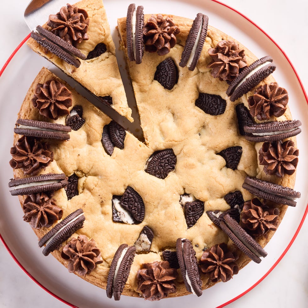 cookie cake with oreos mixed in and on top with chocolate frosting