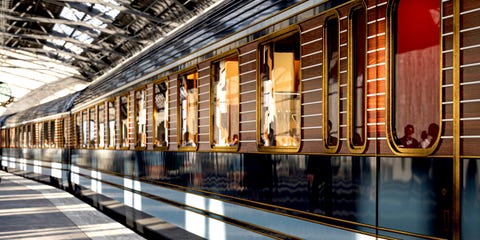 luxury train car at a station