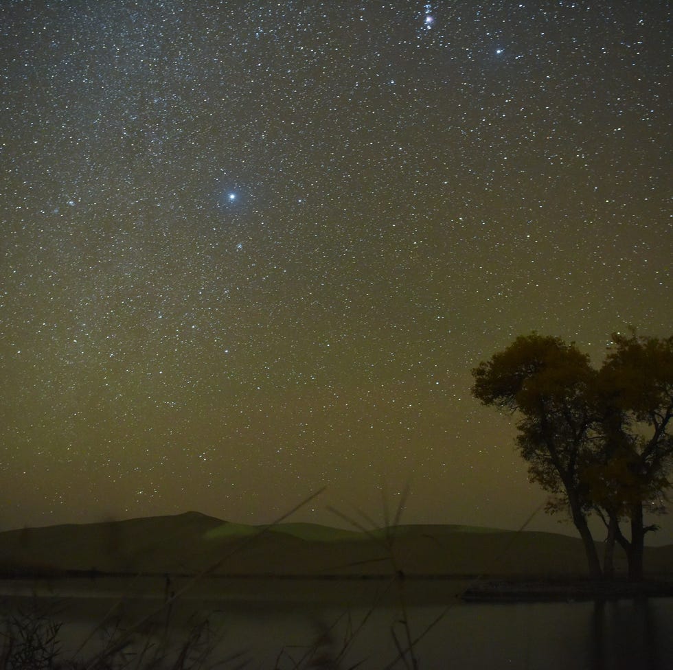 bayingolin, china   october 21 the orionid meteor shower lights up the night sky at yuli county on october 21, 2020 in bayingolin mongol autonomous prefecture, xinjiang uygur autonomous region of china photo by xue bingvcg via getty images