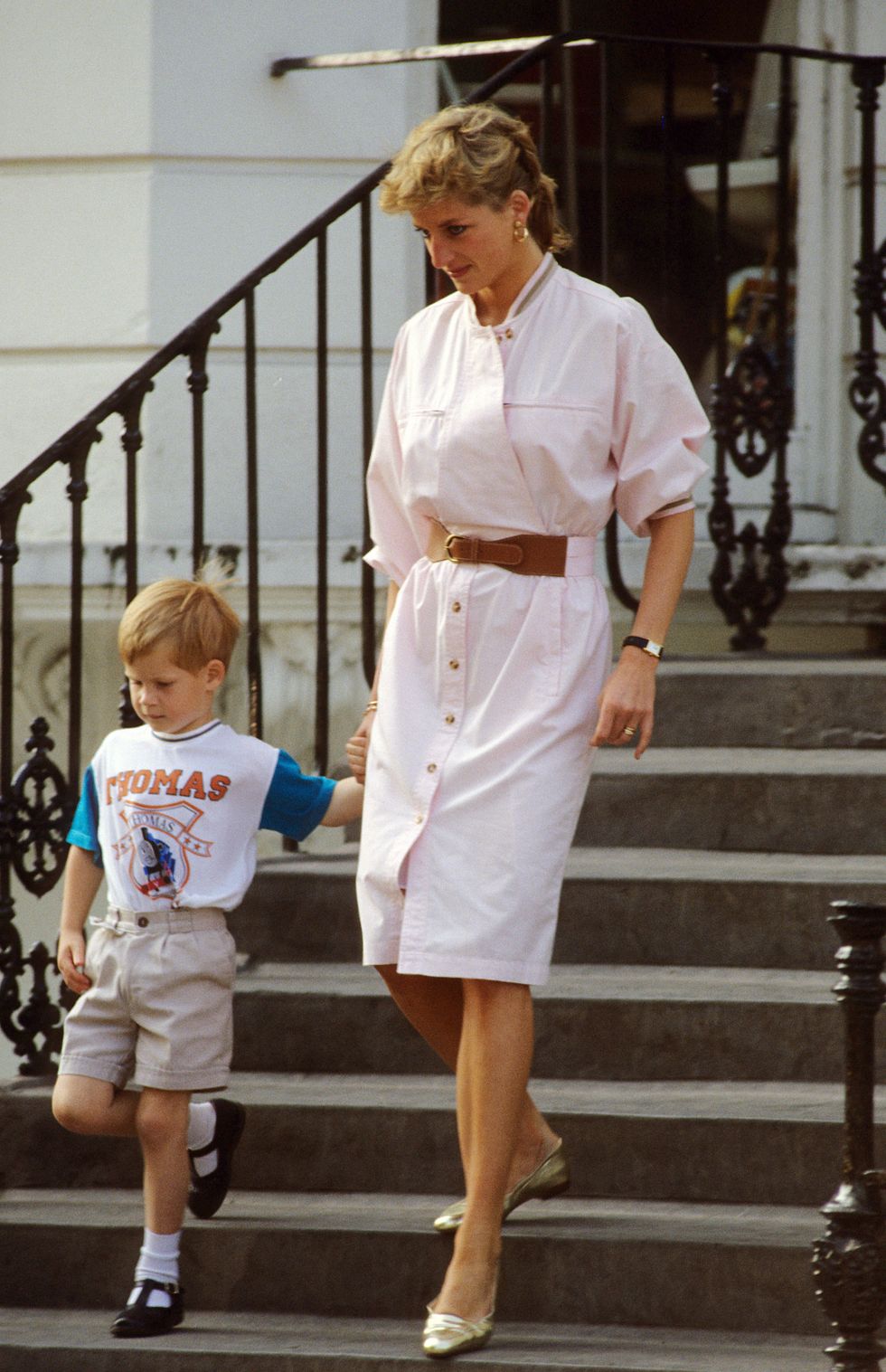 london   june file photo prince harry wears a thomas the tank engine tee shirt when he leaves nursery school with his mother, diana, princess of wales  in june 1989  in london, england  photo by anwar husseinwireimage