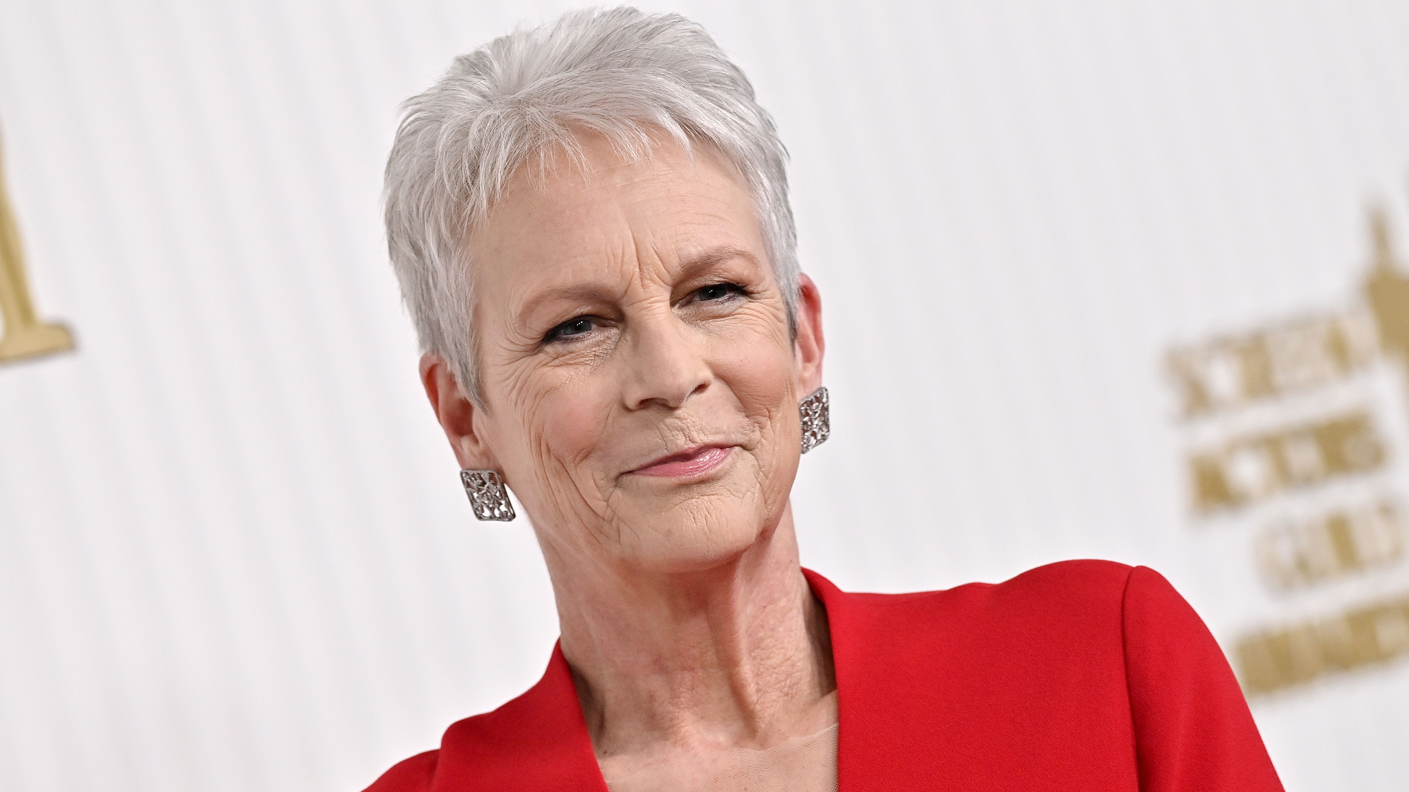 Everything Everywhere All at Once' Star Jamie Lee Curtis Wows in a Plunging  Red Dress
