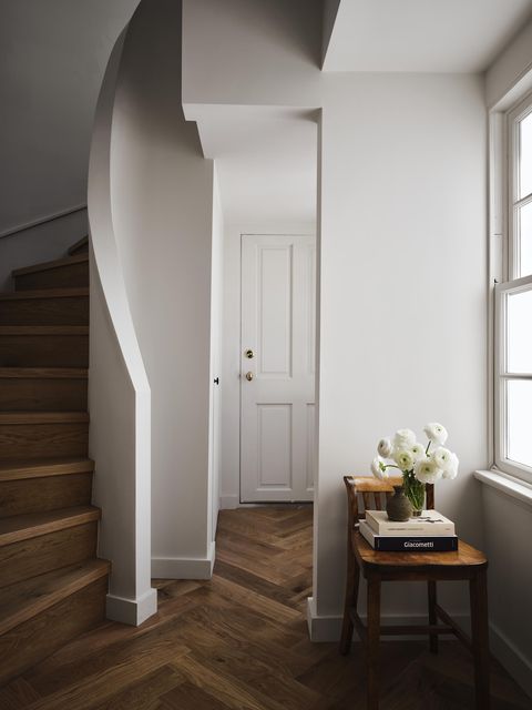 staircase, wood floors, white walls