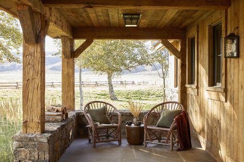 front porch with chairs and outdoor view
