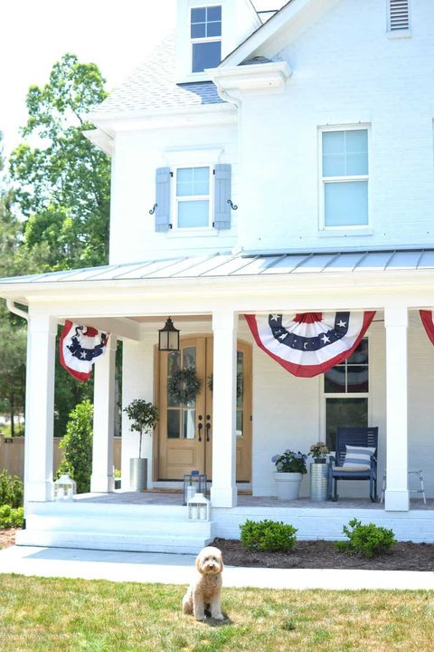 southern front porch with american flag decor
