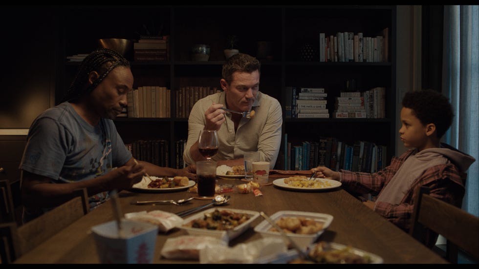 a group of people eating at a table