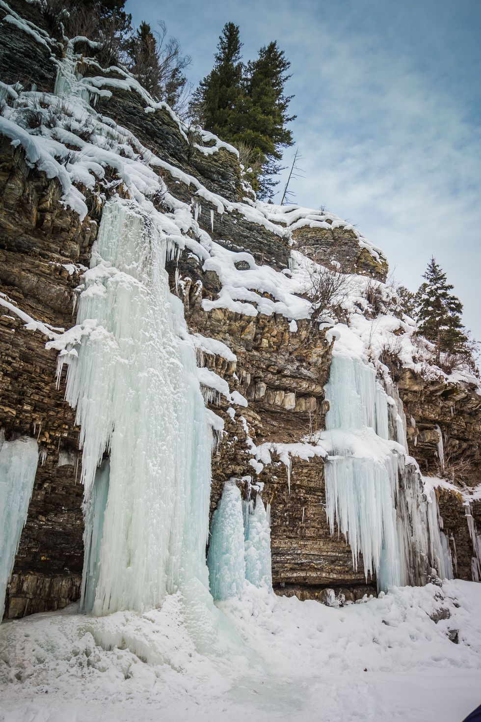 ice falls along the ousel falls trail near big sky resort