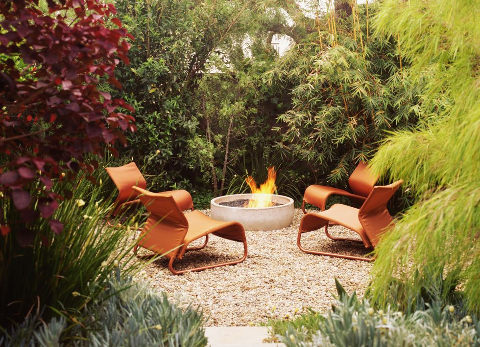 outdoor fireplace and chairs