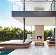 modern backyard with outdoor fireplace
