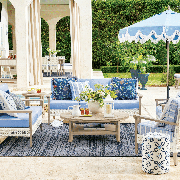 spring refresh collection frontgate outdoor couch, outdoor chair, drink stand, umbrella, outdoor cushions