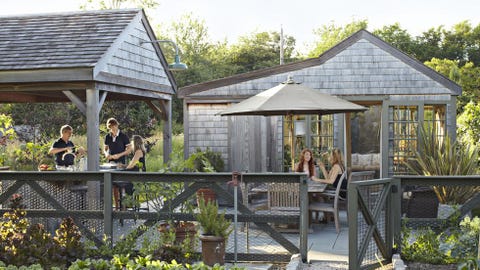 wood deck seating area in outdoor kitchen ideas