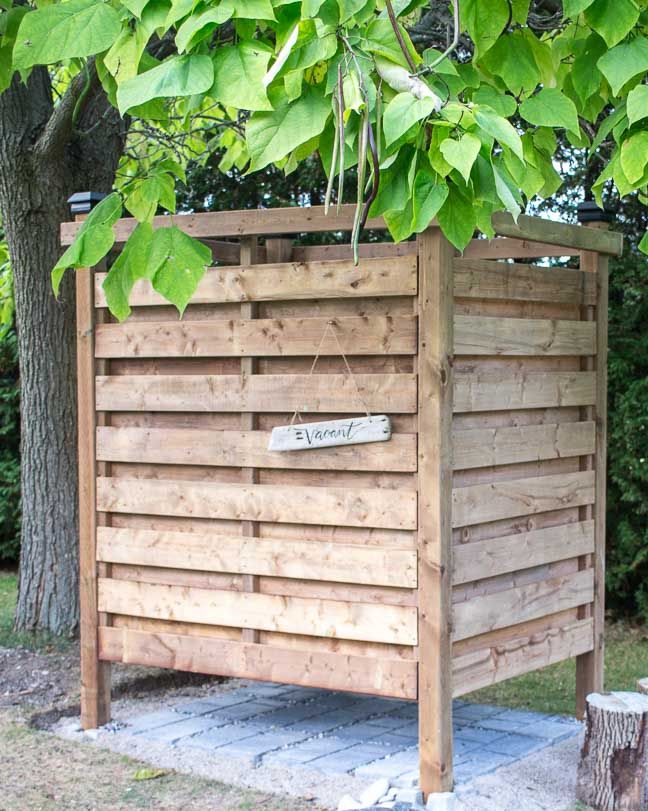 diy wood plank outdoor shower enclosure