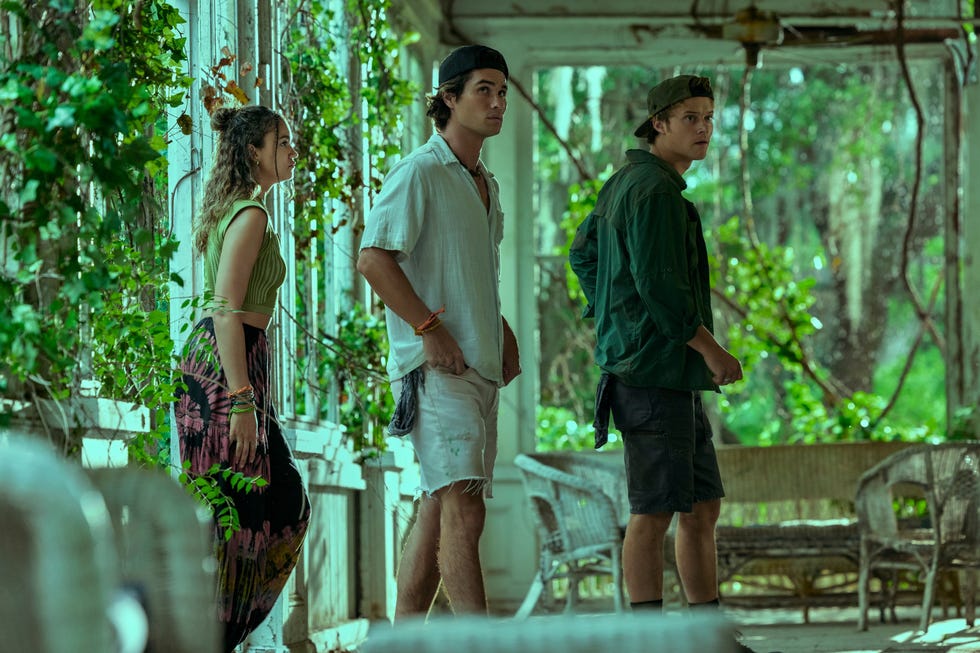 Outer Banks from left to right: Madison Bailey as Kiara, Chase Stokes as John B, Rudy Pankow as JJ in episode 402 of Outer Banks, Cr Jackson Lee Davis, Netflix