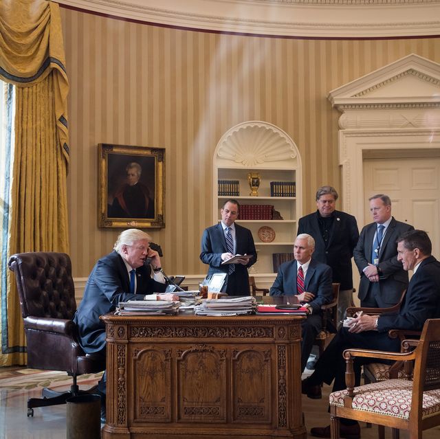 washington, dc   january 28 president donald trump speaks on the phone with russian president vladimir putin in the oval office of the white house, january 28, 2017 in washington, dc also pictured, from left, white house chief of staff reince priebus, vice president mike pence, white house chief strategist steve bannon, press secretary sean spicer and national security advisor michael flynn on saturday, president trump is making several phone calls with world leaders from japan, germany, russia, france and australia photo by drew angerergetty images