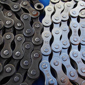 Metal, Bicycle part, Bicycle drivetrain part, Font, Bicycle chain, Pattern, Office equipment, Circle, 